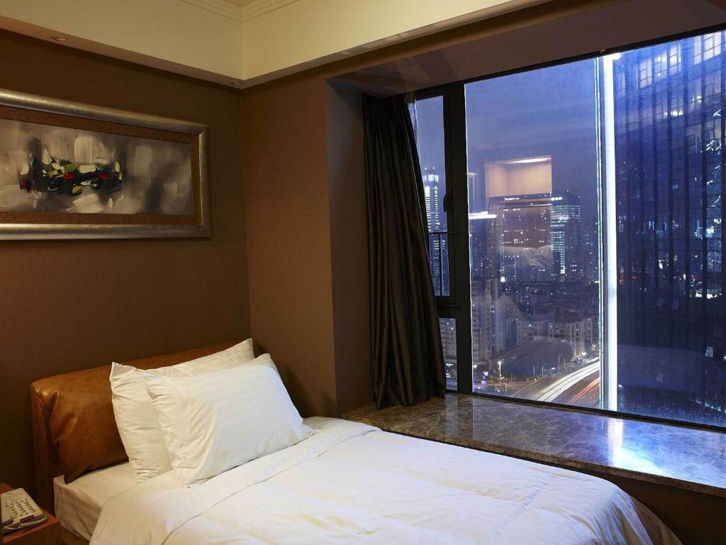 גואנגג'ואו Dan Executive Hotel Apartment Zhujiang New Town חדר תמונה